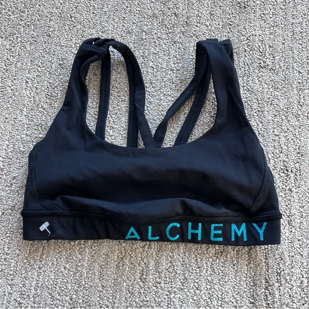Lululemon alchemy bra in black with turquoise writing